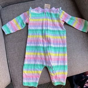 Never worn baby zip up onesie with ruffles